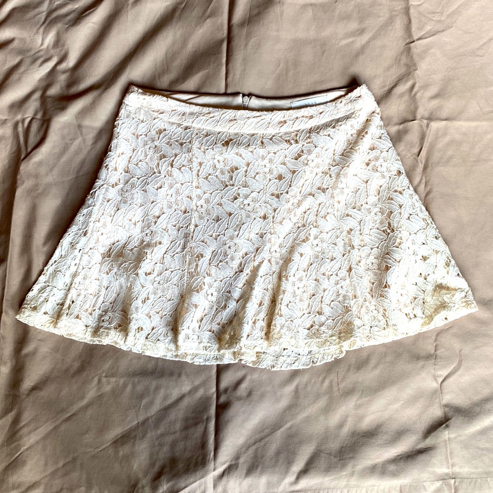 White lace mini skirt